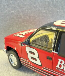 Bud Slammed Suburban and Chevrolet stock car.7 HEIC